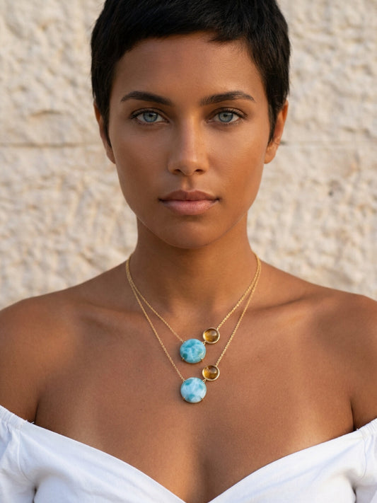 Double chain necklace, worn by a model