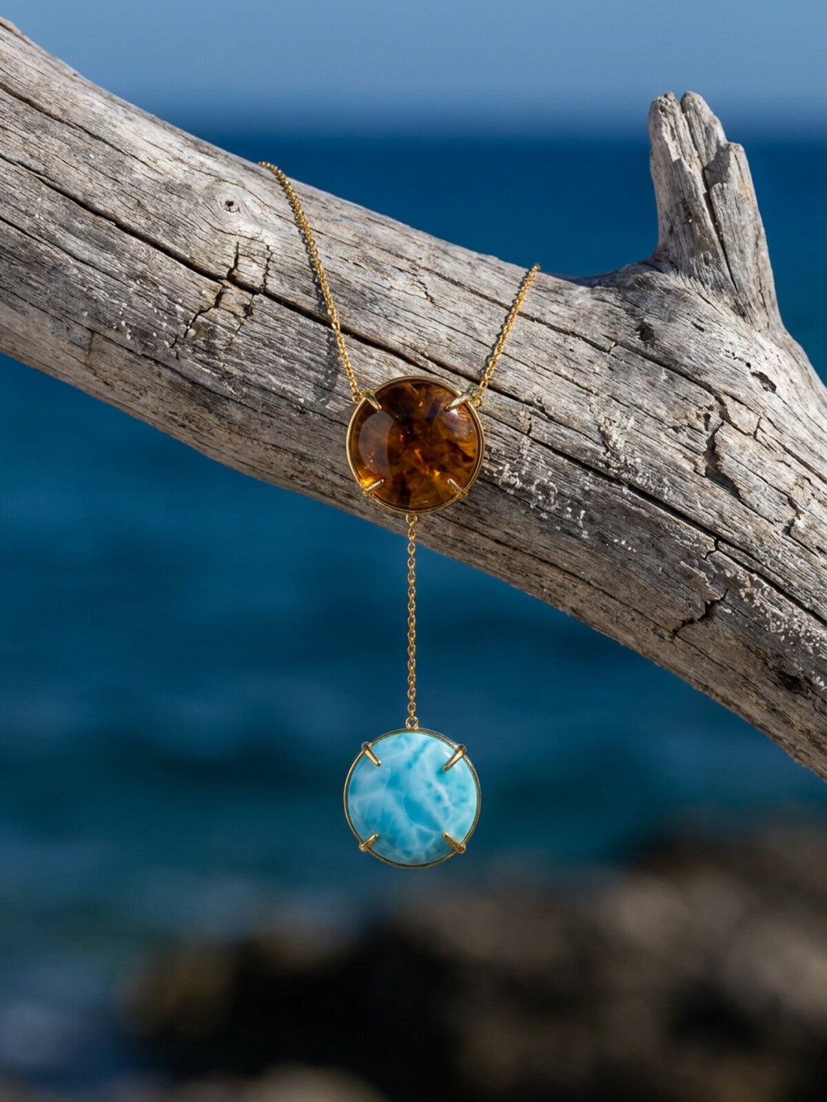 Larimar and amber necklace, photographed on the beach