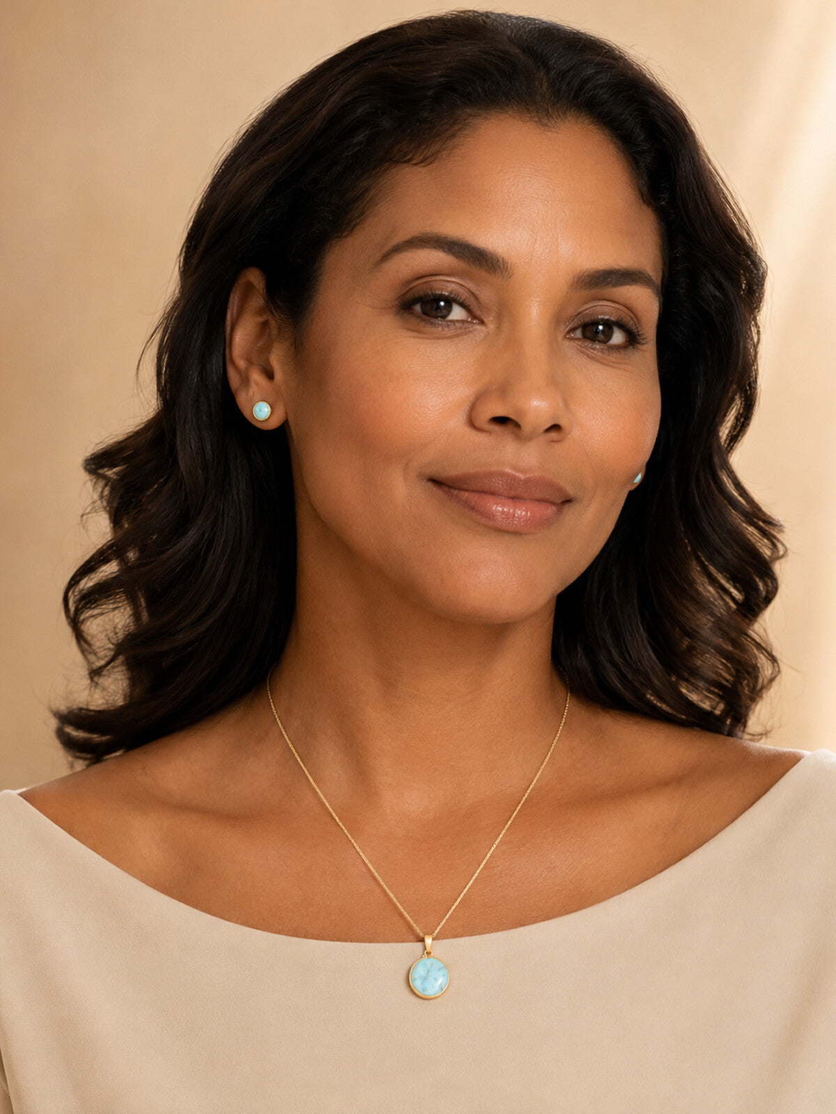 Round larimar necklace, worn by a model