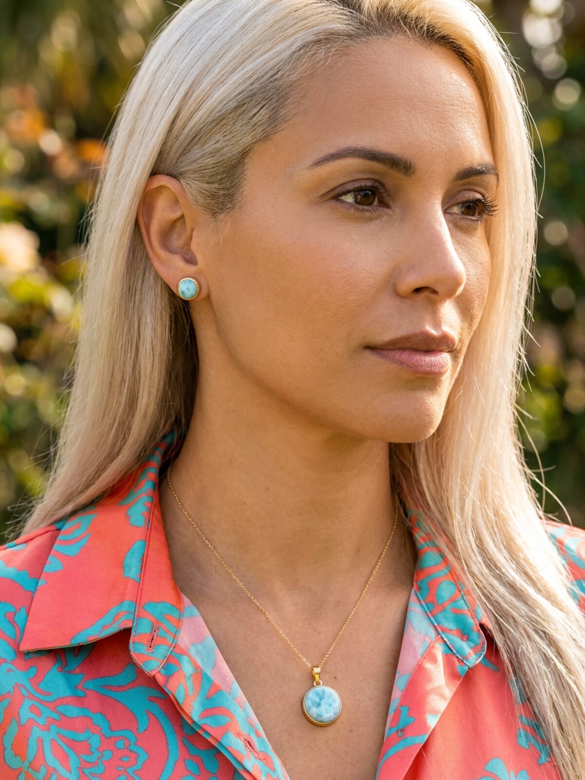 Larimar stud earrings 6mm, worn by a model