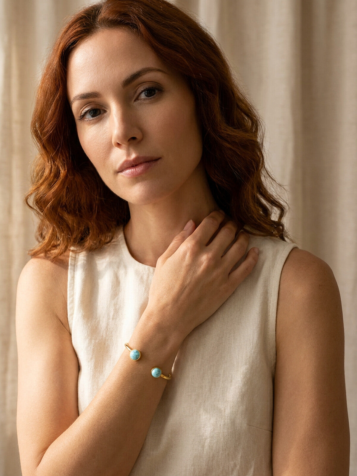 Round larimar bracelet, worn by a model