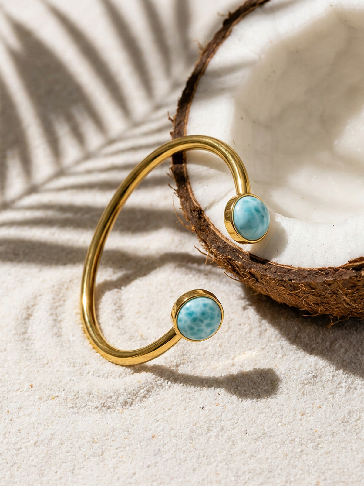 Round larimar bracelet, photographed on the beach