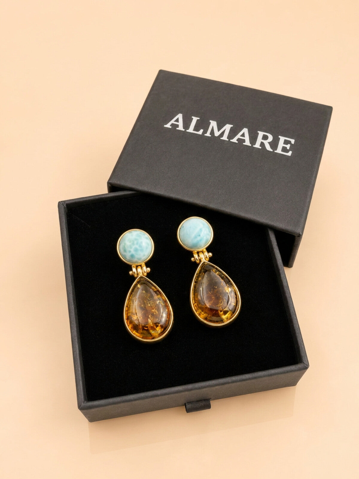 Amber teardrop earrings with larimar, in the black Almare gift box