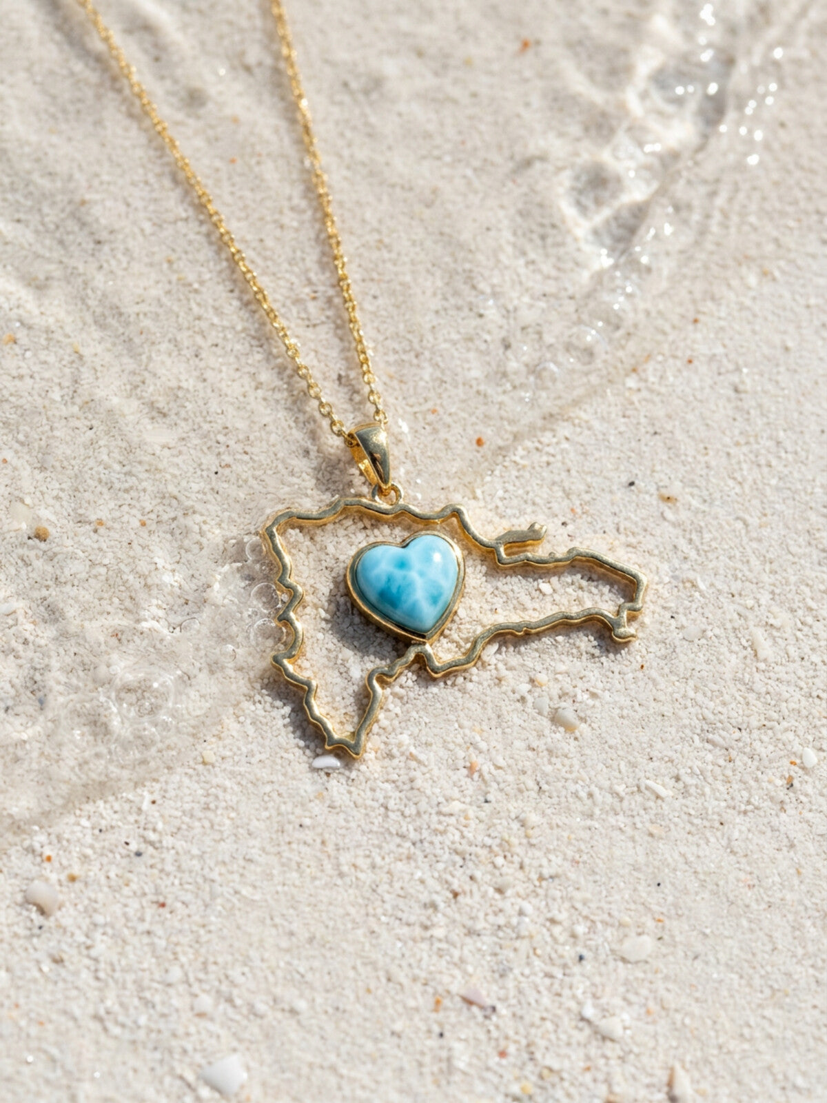 Dominican Republic map larimar necklace, photographed on the beach