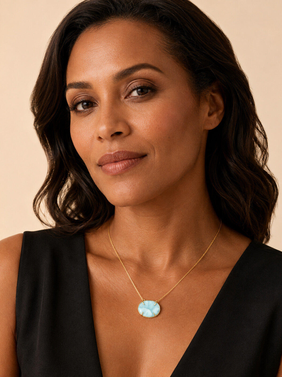 Oval larimar necklace, worn by a model